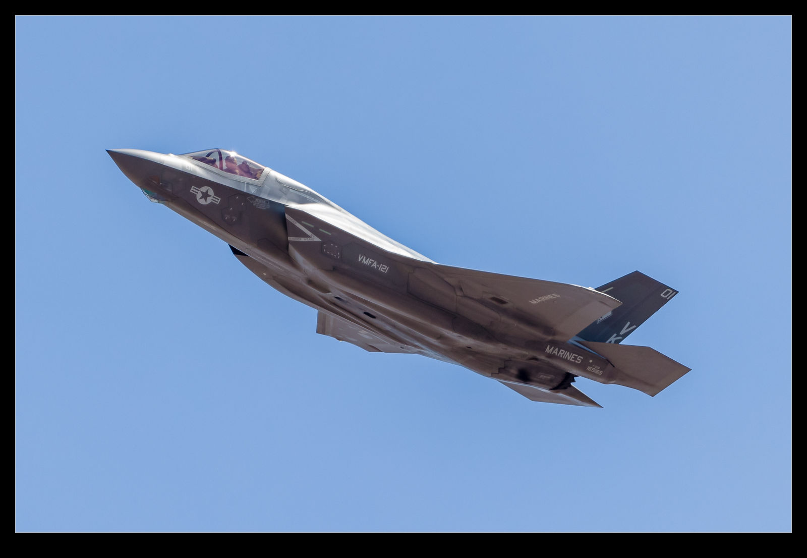 A USMC F-35B climbs out after takeoff from Nellis AFB on a Red Flag mission.